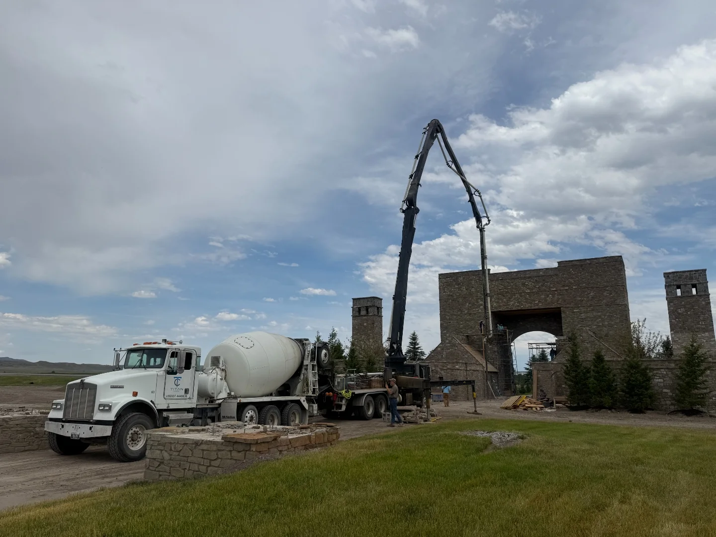 Titan Concrete mixer truck and concrete boom pump working at a Montana jobsite